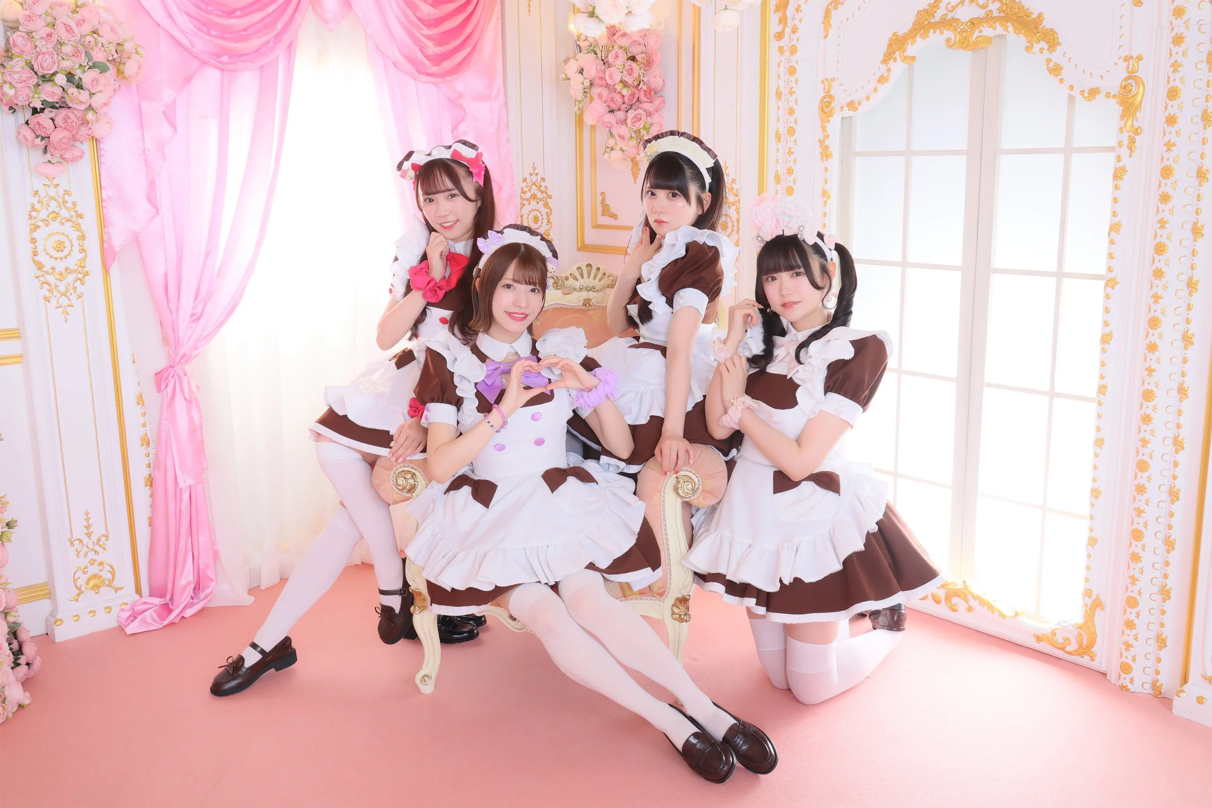 @home cafe maids in their official pink-and-white setting