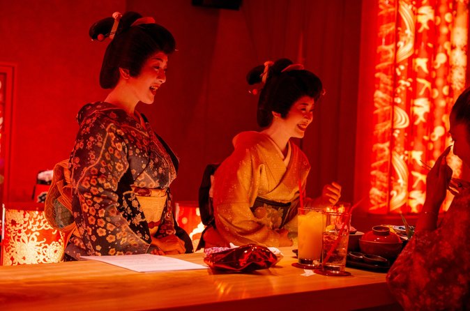 Two geisha entertaining guests during the selected Shimbashi dining experience