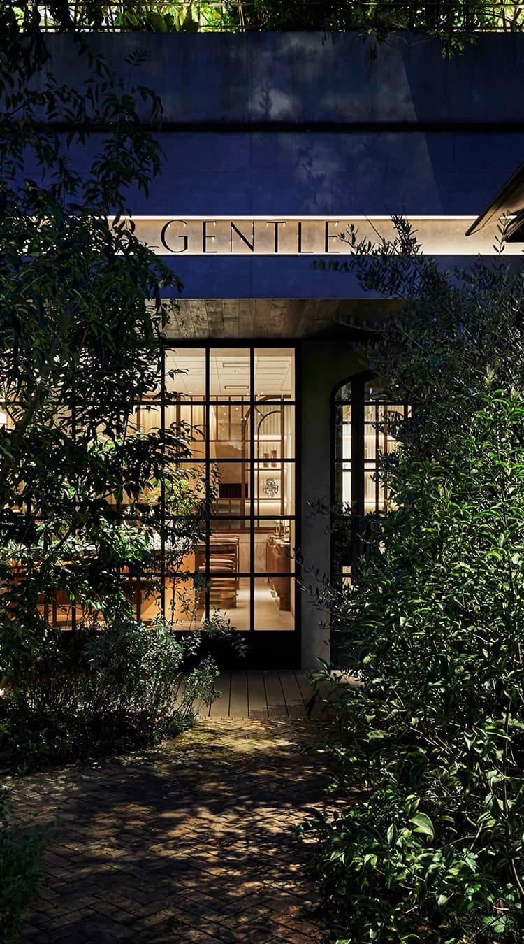 Green entrance to GENTLE Dining and Sushi Bar in Omotesando