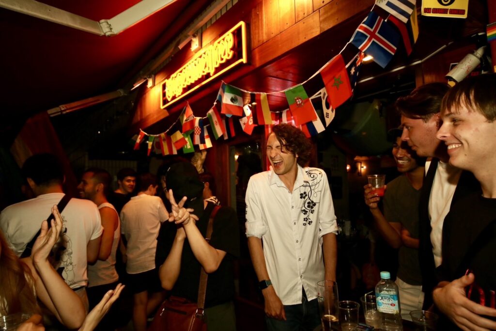 Friends enjoying a drink at a Shinjuku Ni-chome gay bar