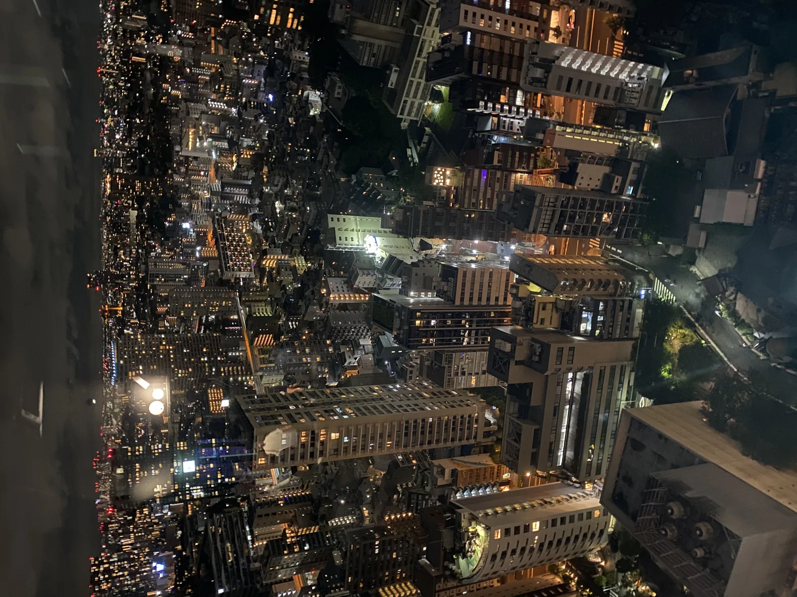Tokyo city lights viewed through the windows of Tokyo Tower at night