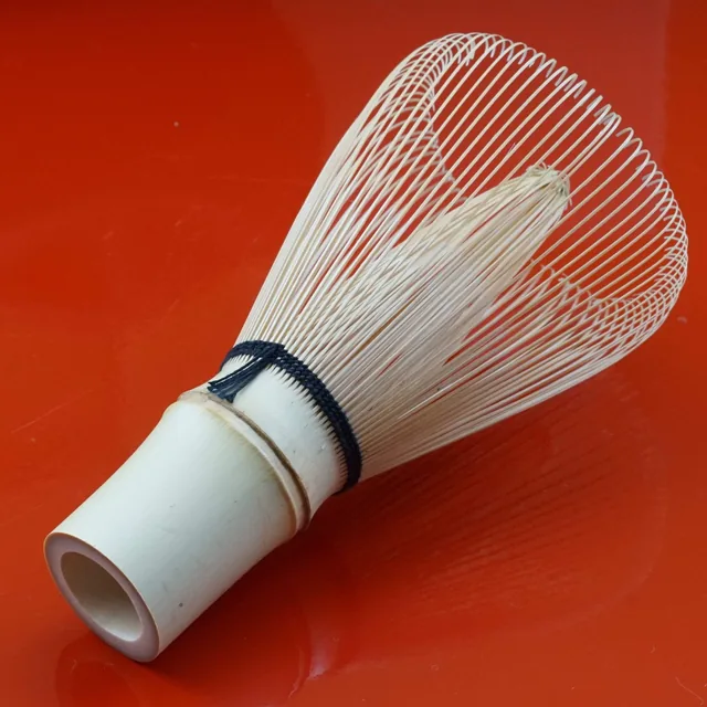Close-up of a Takayama chasen's split bamboo tines